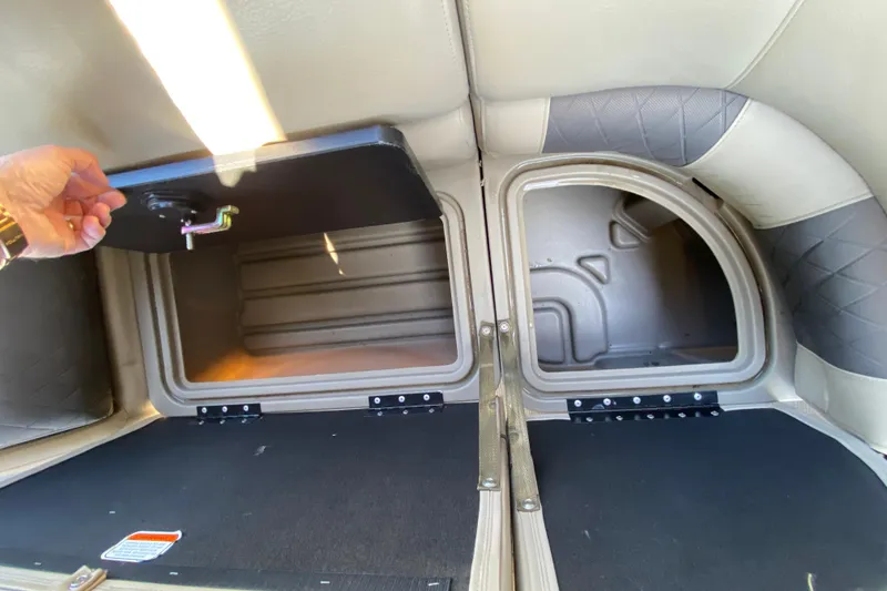 Slide: The Image of Storage compartments on a 2021 Sun Tracker Party Barge 22 DLX boat. - 18