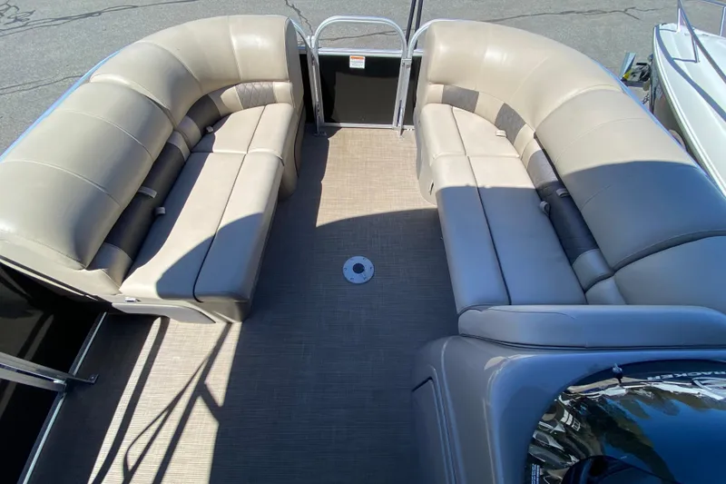 Slide: The Image of 2021 Sun Tracker Party Barge 22 DLX interior with spacious seating and modern design. - 8