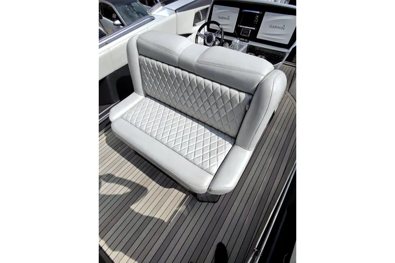 Slide: The Image of Luxurious seating on 2017 Monte Carlo 420 boat with diamond-stitched upholstery and modern dashboard. - 15