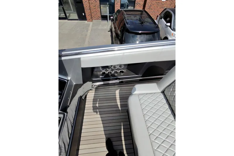 Slide: The Image of Interior of 2017 Monte Carlo 420 boat with quilted seating and cup holders. - 16