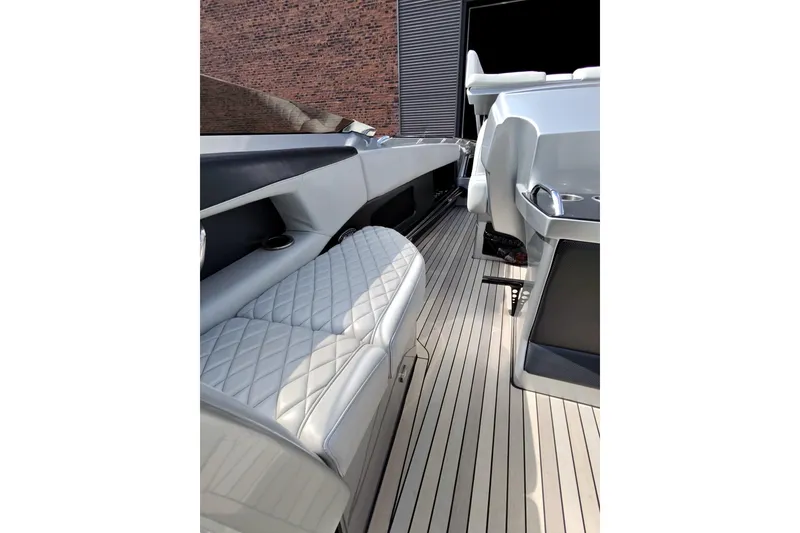 Slide: The Image of Luxurious interior of 2017 Monte Carlo 420 yacht with quilted seating and sleek design. - 18