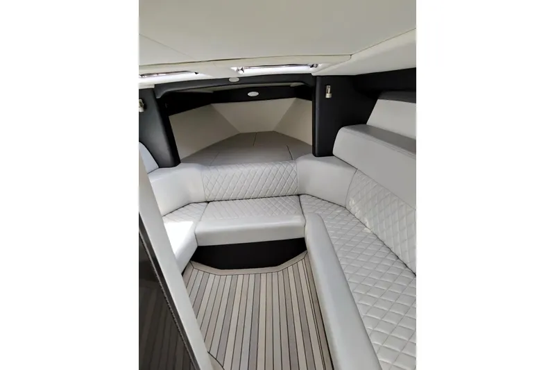Slide: The Image of Luxurious interior of 2017 Monte Carlo 420 yacht with quilted seating and sleek design. - 19
