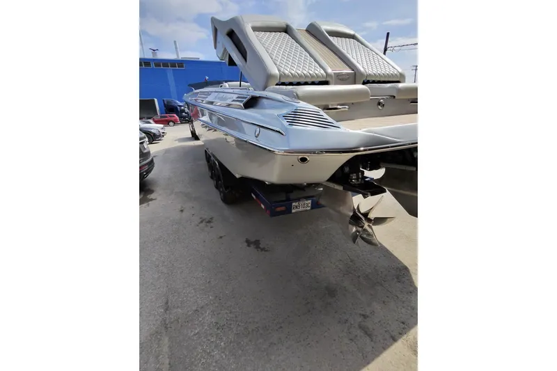 Slide: The Image of Monte Carlo 420 boat, 2017 model, on trailer in outdoor setting. - 22