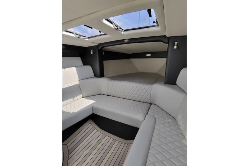 Slide: The Image of Luxurious interior of 2017 Monte Carlo 420 yacht with quilted seating and skylights. - 26