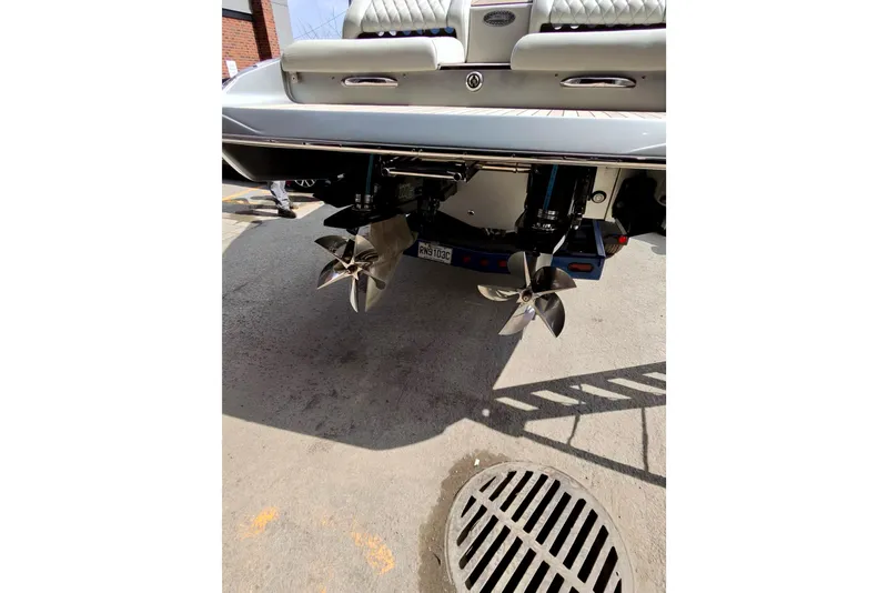 Slide: The Image of Rear view of a 2017 Monte Carlo 420 boat showing dual propellers. - 31