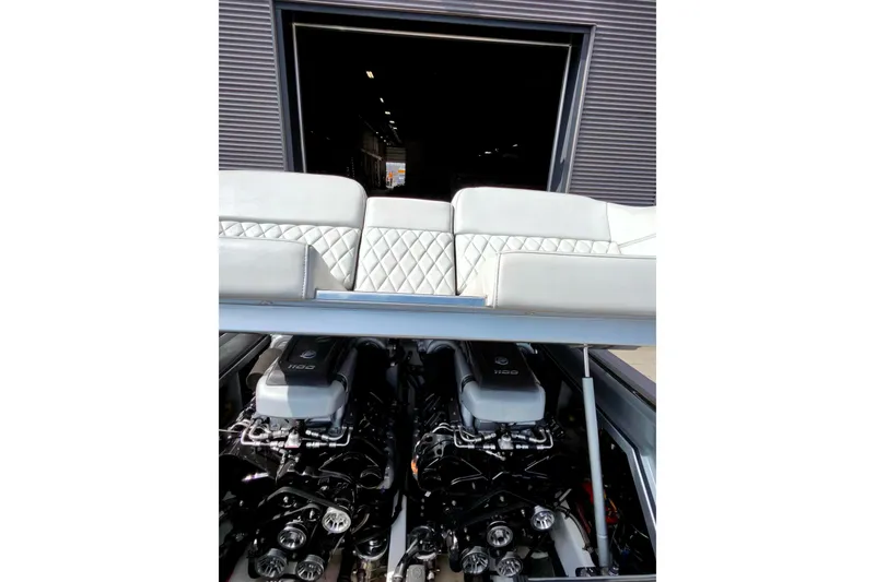 Slide: The Image of Engine compartment of a 2017 Monte Carlo 420 boat with luxurious seating. - 34