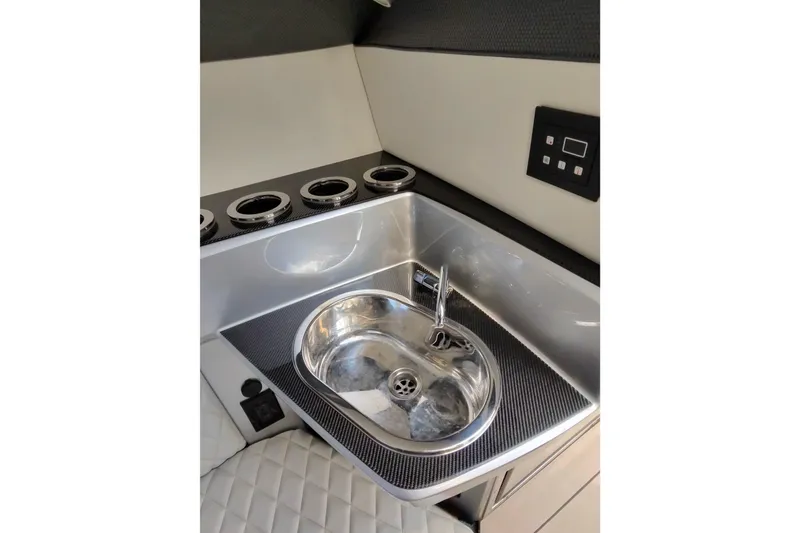 Slide: The Image of 2017 Monte Carlo 420 yacht interior with sleek sink and control panel. - 38