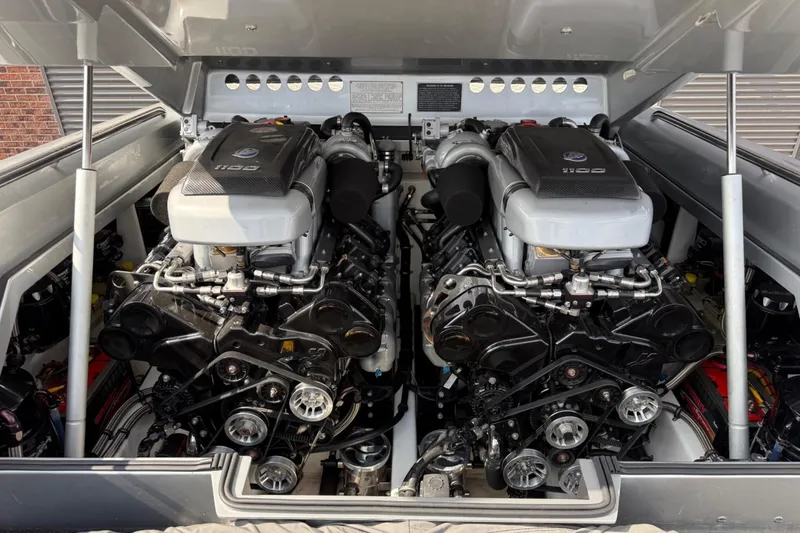 Slide: The Image of Twin engines in a 2017 Monte Carlo 420 boat, showcasing powerful performance. - 42