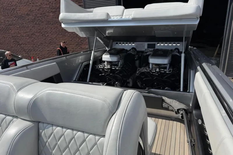 Slide: The Image of Luxury Monte Carlo 420 boat interior with open engine compartment, 2017 model. - 51