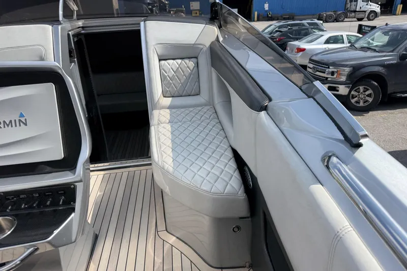 Slide: The Image of Luxurious interior of a 2017 Monte Carlo 420 yacht with quilted seating. - 54
