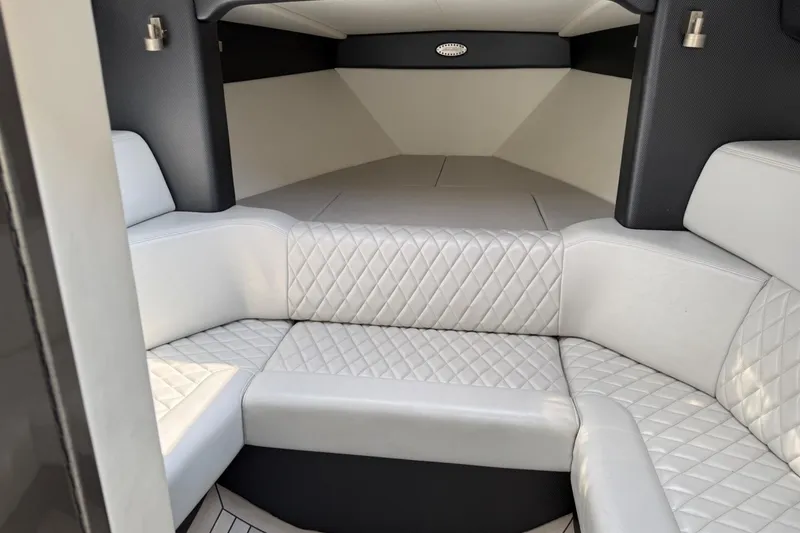 Slide: The Image of Luxurious interior of 2017 Monte Carlo 420 yacht with quilted white seating. - 59