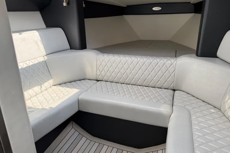 Slide: The Image of Luxurious interior of 2017 Monte Carlo 420 yacht with quilted white seating. - 61