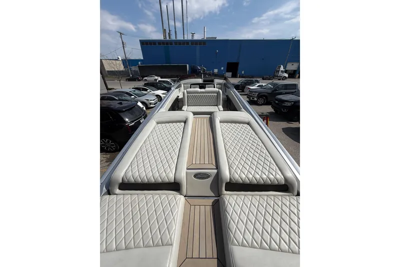 Slide: The Image of Luxurious 2017 Monte Carlo 420 boat interior with quilted seating and sleek design. - 69