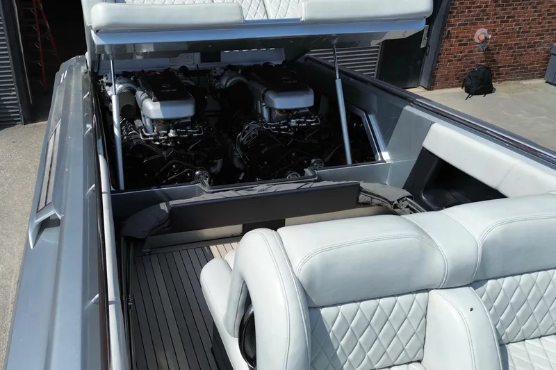 Slide: The Image of Luxury Monte Carlo 420 boat interior with dual engines, 2017 model, featuring quilted seating. - 7