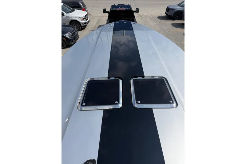 Slide: The Image of Monte Carlo 420 boat deck, 2017 model, with sleek black stripe design. - 70