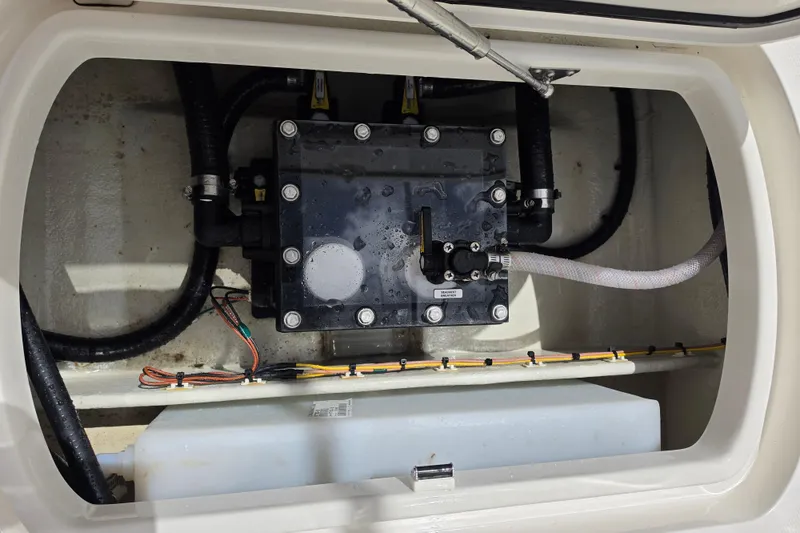 Slide: The Image of 2025 SeaVee 270Z boat compartment showcasing internal mechanical components and wiring. - 8