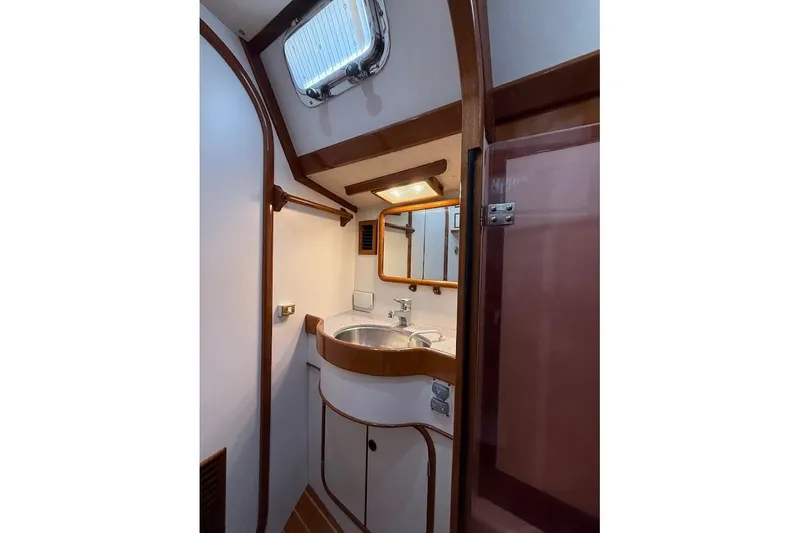 Slide: The Image of Bathroom interior of 1997 Taswell 50 yacht with sink and mirror. - 16