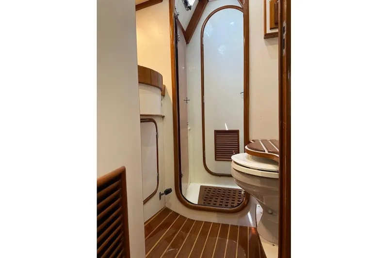 Slide: The Image of Bathroom interior of 1997 Taswell 50 yacht with wooden accents and modern fixtures. - 17