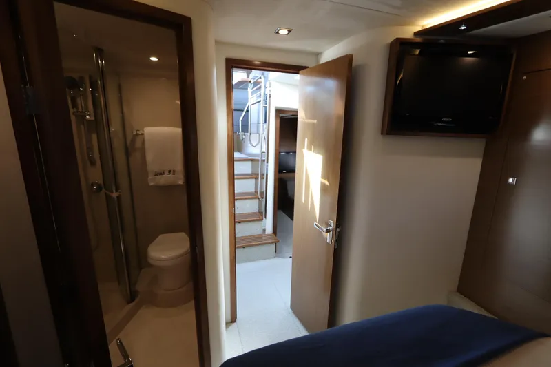 Slide: The Image of Interior of 2015 Cruisers Yachts 45 Cantius with bathroom and stairs. - 11