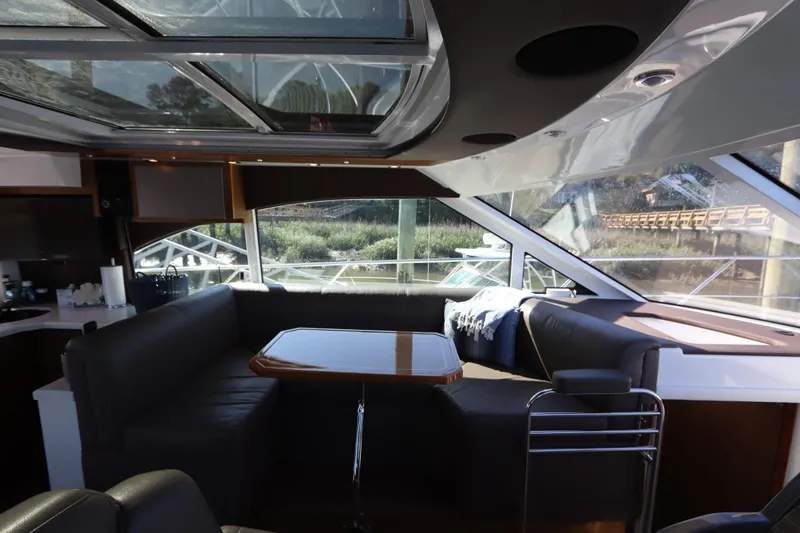 Slide: The Image of Interior of 2015 Cruisers Yachts 45 Cantius with panoramic windows. - 14