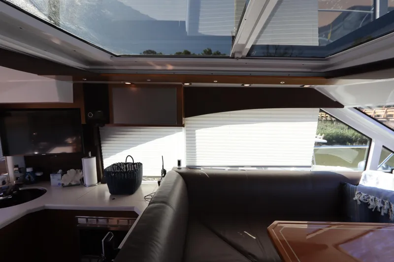 Slide: The Image of Interior of 2015 Cruisers Yachts 45 Cantius with panoramic windows. - 17