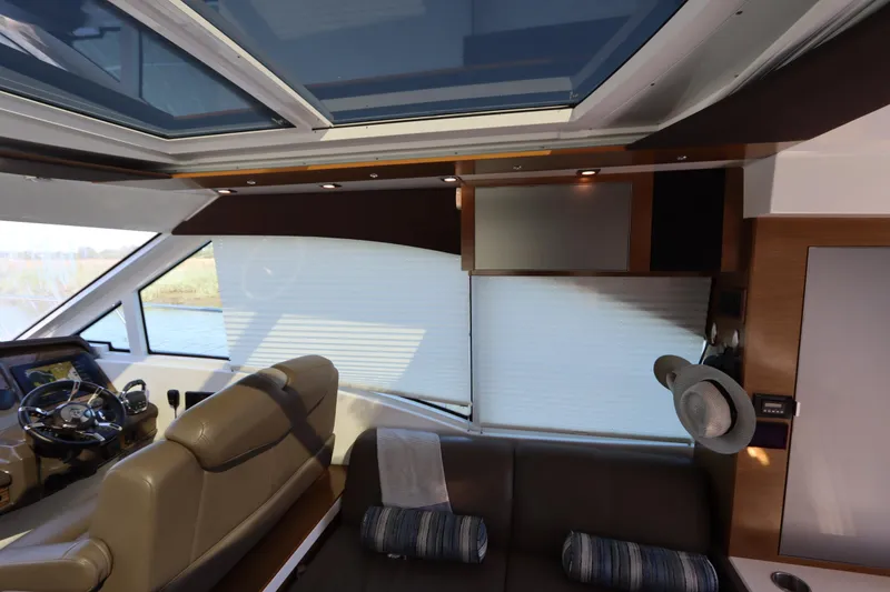 Slide: The Image of Interior of 2015 Cruisers Yachts 45 Cantius with panoramic windows. - 18
