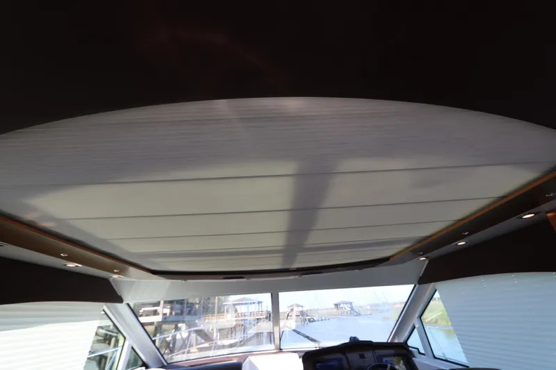 Slide: The Image of Interior view of 2015 Cruisers Yachts 45 Cantius with panoramic roof. - 19