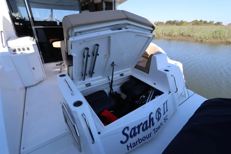 Slide: The Image of 2015 Cruisers Yachts 45 Cantius with open rear storage compartment. - 22