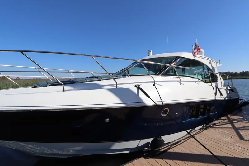Slide: The Image of 2015 Cruisers Yachts 45 Cantius docked, blue sky. - 3