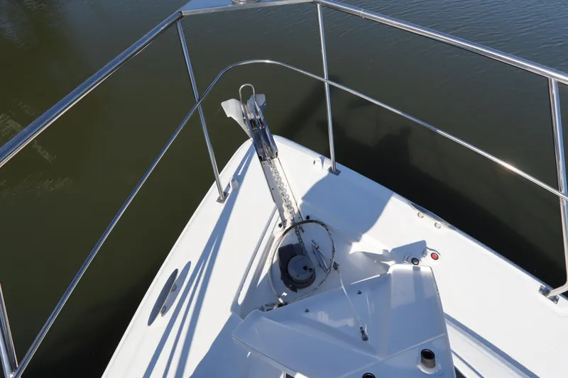 Slide: The Image of Bow view of 2015 Cruisers Yachts 45 Cantius on water. - 33