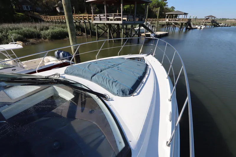Slide: The Image of 2015 Cruisers Yachts 45 Cantius at dock, bow deck view. - 35