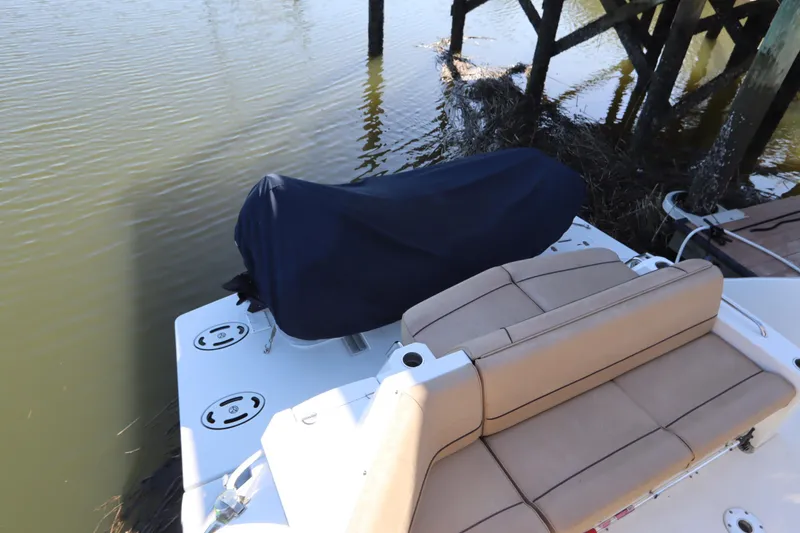 Slide: The Image of Aft section of 2015 Cruisers Yachts 45 Cantius with cover. - 39