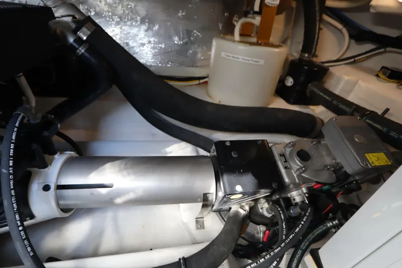 Slide: The Image of Engine room of 2015 Cruisers Yachts 45 Cantius with technical components. - 44