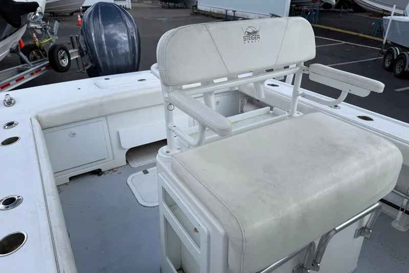 Slide: The Image of 2022 Steiger Craft 255 Tournament boat interior with seating and storage compartments. - 4