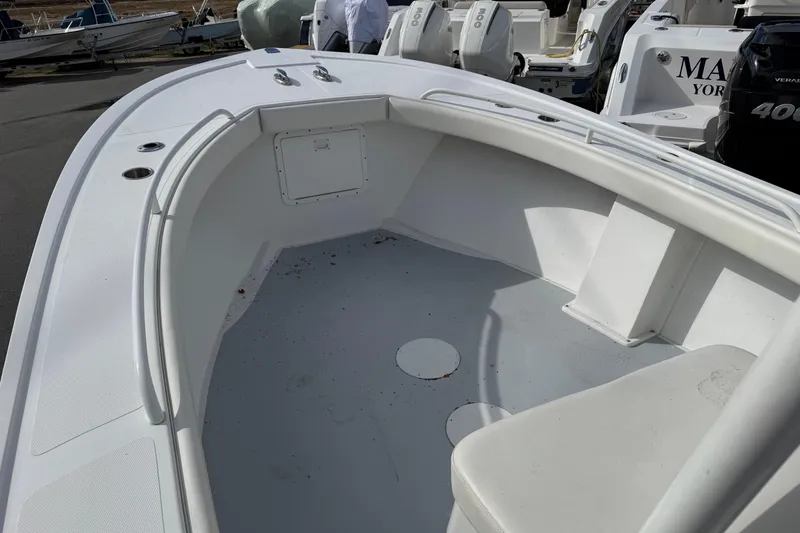 Slide: The Image of 2022 Steiger Craft 255 Tournament boat interior with seating and storage compartments. - 5