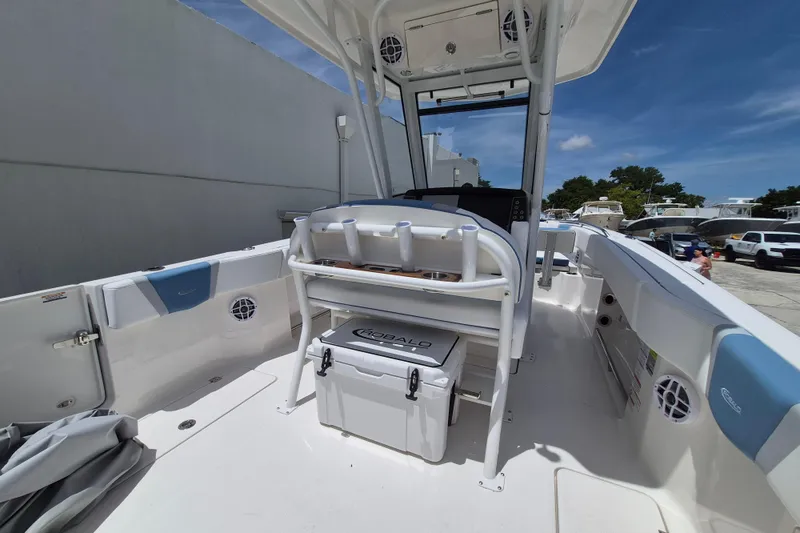 Slide: The Image of 2026 Robalo R250 Center Console boat interior with seating and storage. - 14