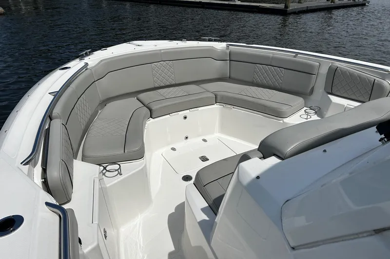 Slide: The Image of 2023 Pursuit S 328 Sport boat with spacious seating and elegant design. - 6