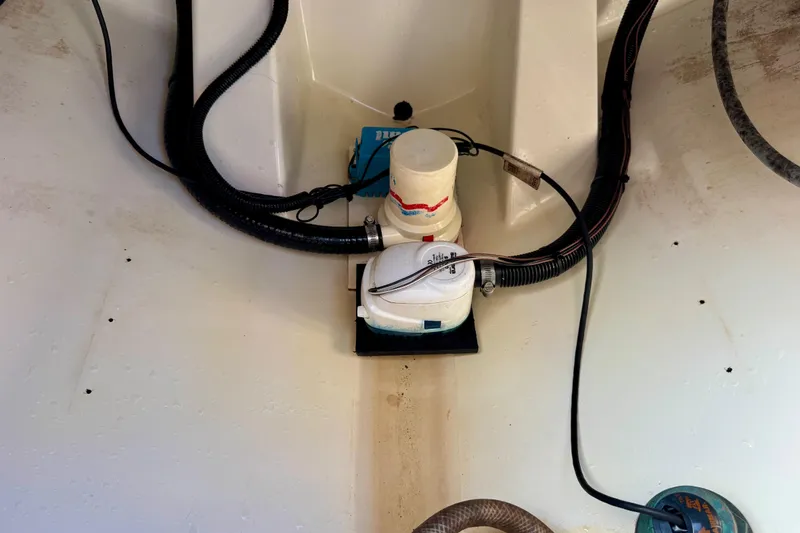 Slide: The Image of Bilge pump system in a 1994 Regulator 23 Center Console boat. - 11