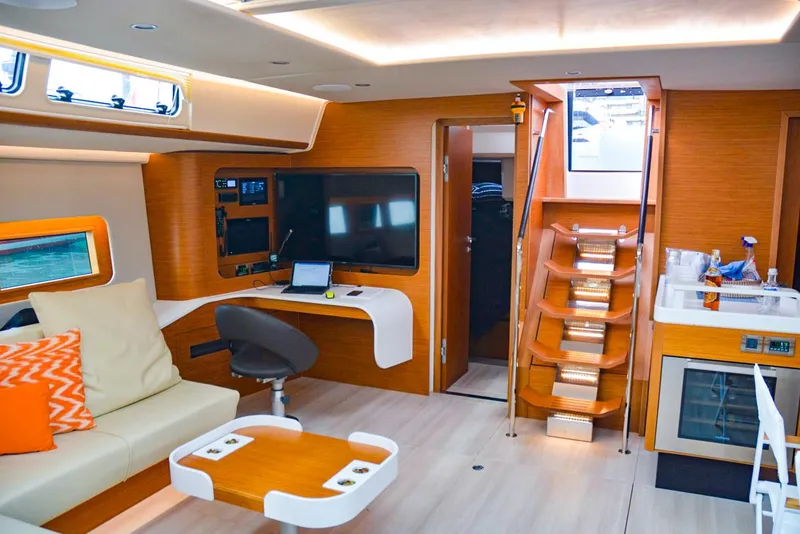 Slide: The Image of Luxurious interior of 2018 Hanse 675 yacht with modern furnishings and sleek design. - 14