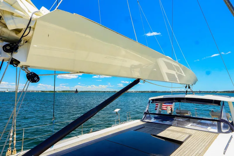 Slide: The Image of Sailing yacht Hanse 675 (2018) on open water under clear blue sky. - 23