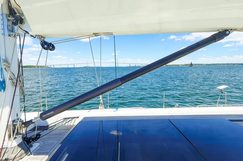 Slide: The Image of Sailing on a 2018 Hanse 675 yacht, featuring a sleek deck and ocean view. - 28