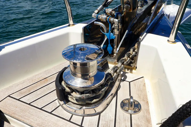 Slide: The Image of Anchor winch on 2018 Hanse 675 yacht deck, with chain and marine equipment. - 33