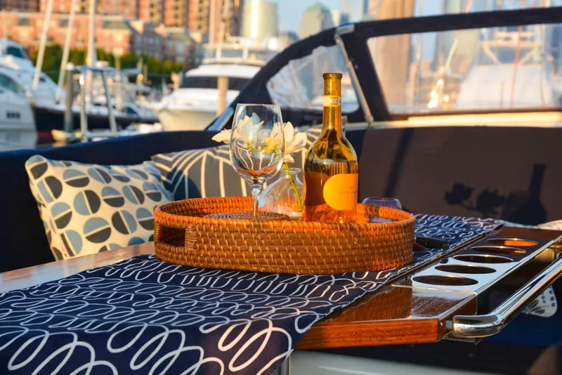 Slide: The Image of Luxurious Hanse 675 yacht interior with wine, glasses, and stylish decor, 2018 model. - 4