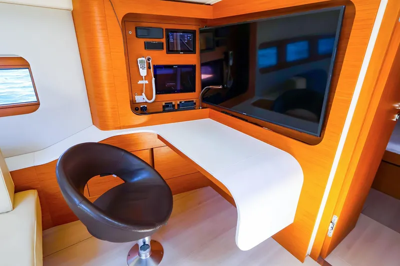 Slide: The Image of Luxurious interior of 2018 Hanse 675 yacht with modern seating and entertainment system. - 50