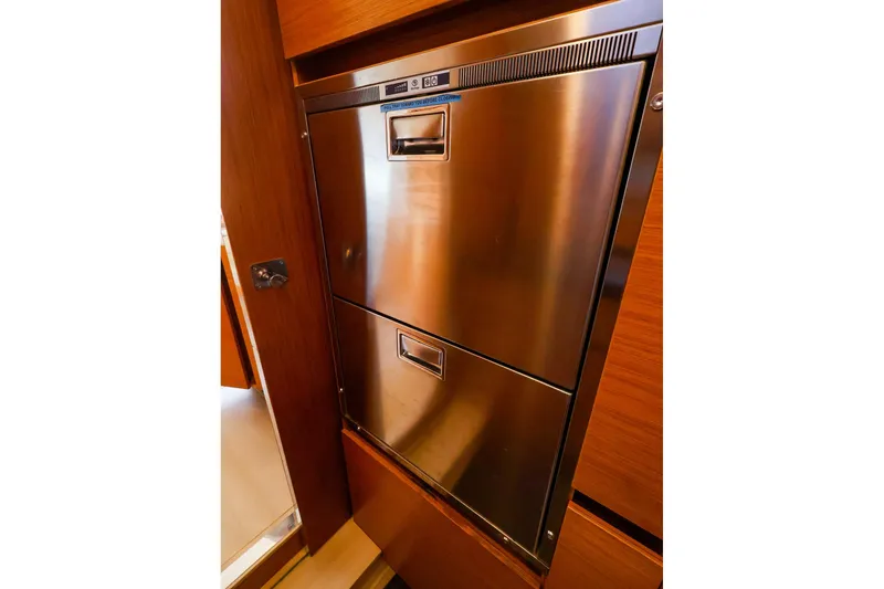 Slide: The Image of Stainless steel refrigerator in 2018 Hanse 675 yacht interior. - 63
