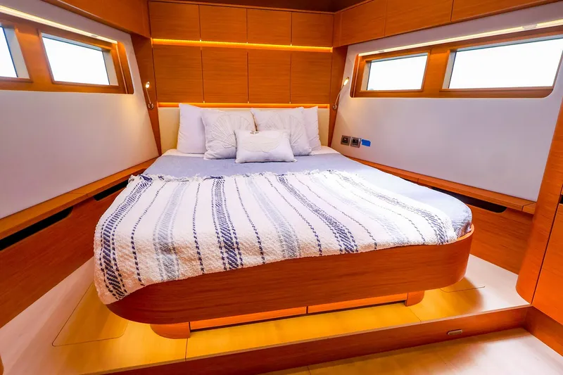 Slide: The Image of Luxurious cabin interior of 2018 Hanse 675 yacht with cozy bed and modern design. - 65