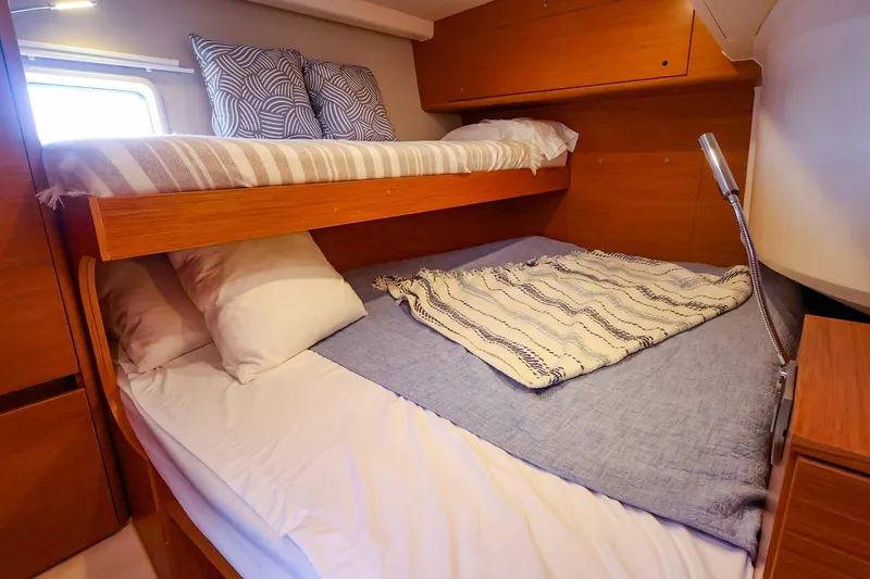 Slide: The Image of Cozy cabin interior with bunk beds on 2018 Hanse 675 yacht. - 76