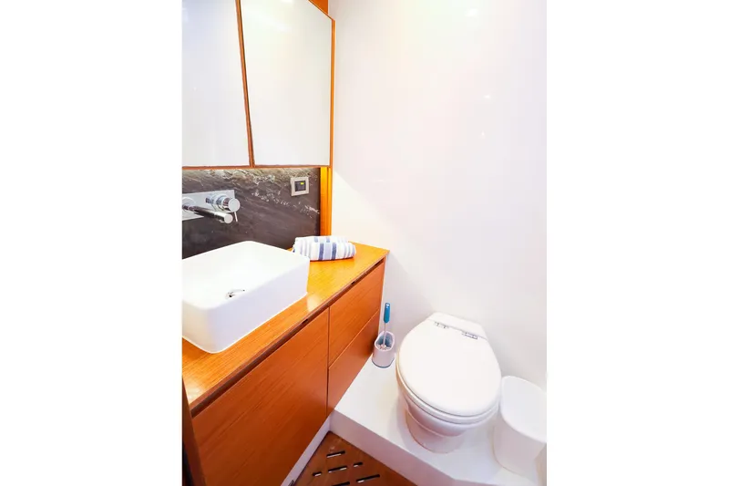 Slide: The Image of Modern bathroom in 2018 Hanse 675 yacht with sleek sink and toilet. - 77