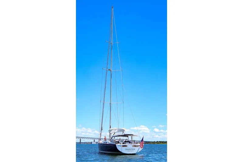 Slide: The Image of 2018 Hanse 675 sailboat on water under clear blue sky. - 84