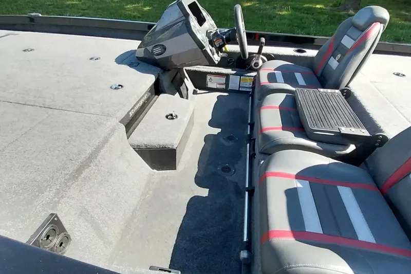 Slide: The Image of 2023 Ranger RT198P boat interior with dual seats and steering console. - 10